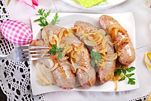 Roasted white sausage with onion for easter