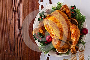 Roasted whole chicken with Christmas decoration