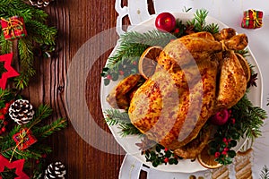 Roasted whole chicken with Christmas decoration