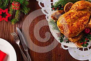 Roasted whole chicken with Christmas decoration