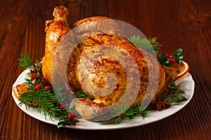 Roasted whole chicken with Christmas decoration