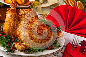 Roasted whole chicken with Christmas decoration