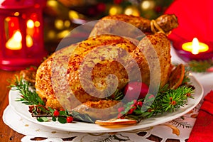 Roasted whole chicken with Christmas decoration