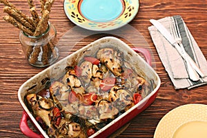 A roasting pan full of chicken thighs