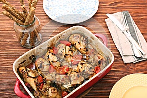 A roasting pan full of chicken thighs