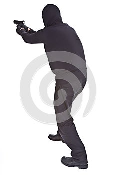 Robber aiming with his gun