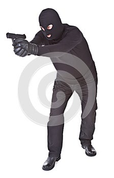 Robber aiming with his gun