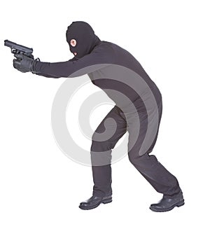 Robber aiming with his gun