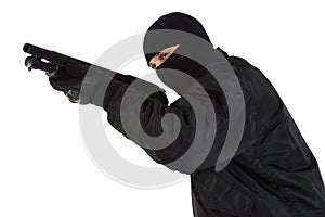 Robber in black mask with shotgun