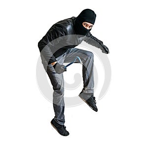 Robber or burglar creeping on tiptoe. Isolated on white.