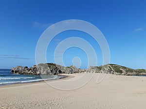 Robberg Beach, looking at rocky outcrop next to the ocean