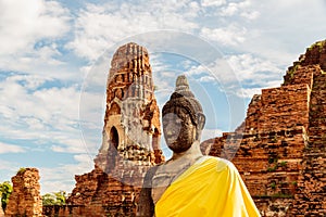 Robed Buddha statue in Wat Mahathat, Ayutthaya Historical Park, Thailand