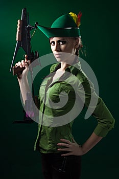 Robin hood style woman with crossbow photo