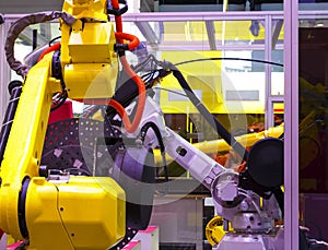 Robot arm in machine tool metalworking process for industry manufacture,CNC metal machining.