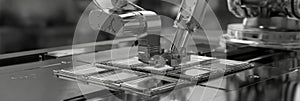 Robot Arms Assembling Microchips in a High-Tech Manufacturing Facility
