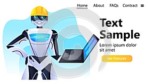 robot engineer in helmet using laptop modern robotic character artificial intelligence concept