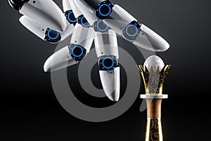 Robot hand, artificial intelligence plays chess. Concept: Solving human problems, developing a neural network, advanced technology