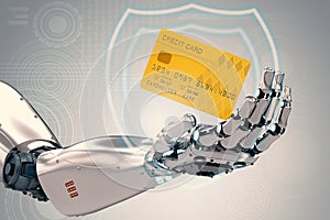 Robot hand holding credit card