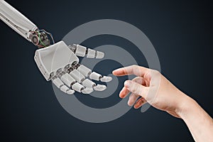 Robot hand and human hand are touching. Artificial intelligence and cooperation concept