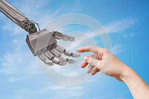 Robot hand and human hand are touching. Artificial intelligence and cooperation concept