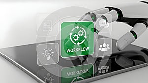 Robot hand interacting with workflow application on a digital tablet