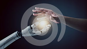 Robot hand touch human hand, the concept of using artificial intelligence technology or Machine learning