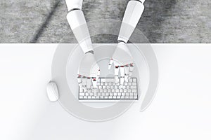Robot hands typing, white table