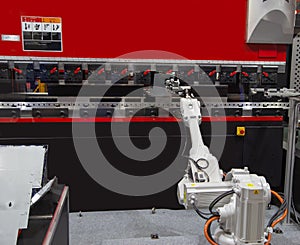 Robot loading metal sheet to hydraulic press