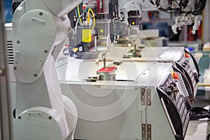 Robot loading mobile phone case to CNC engraving machine