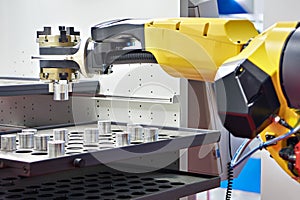 Robot manipulator and metal workpieces