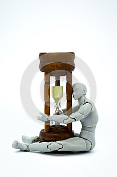 Robot model with hourglass. Image use for time to move forward