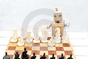 The robot plays a game of chess. Artificial Intelligence