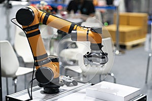 Robot programming arm in automation system photo