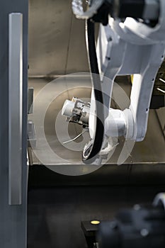 Robot programming arm in automation system