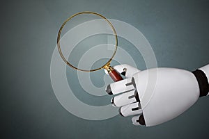 Robot`s Hand Holding Magnifying Glass