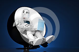 Robot sitting on a chair and holding a laptop. Contains clipping path