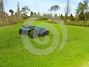 A robot technology lawn mower cutting the grass