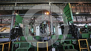 Robot ties up steel bars at the metallurgic factory m/s