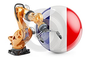 Robotic arm with French flag. Modern technology, industry and production in France concept, 3D rendering