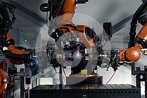 Robotic arm at industrial manufacture factory. Automated production cell.