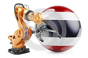Robotic arm with Thai flag. Modern technology, industry and production in Thailand concept, 3D rendering