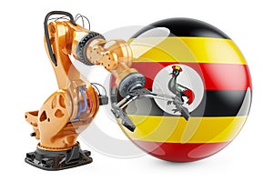 Robotic arm with Ugandan flag. Modern technology, industry and production in Uganda concept, 3D rendering