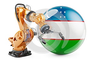 Robotic arm with Uzbek flag. Modern technology, industry and production in Uzbekistan concept, 3D rendering