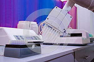 Robotic dispensing machine in modern biochemical laboratory photo