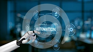 Robotic hand interacting with digital automation interface in modern office, showcasing the integration of technology