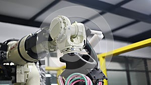 Robotic machine at industrial factory, Engineers working at factory