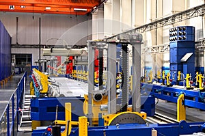 Robotic welding complex in the production workshop factory for the  manufacturing of modern rail transport and locomotives.