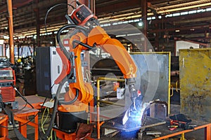 Robotic Welding Machine, Welding a Steel Plate of Steel Structure with Robotic Welding or Robotic Arm Welding at Industrial