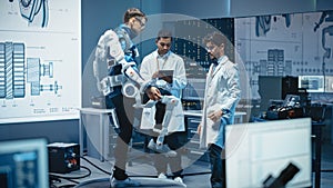 In Robotics Development Laboratory: Engineers and Scientists Work on a Bionics Exoskeleton Prototy