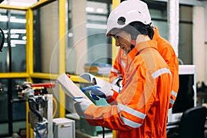 Robotics engineers team discussing and solving problems
